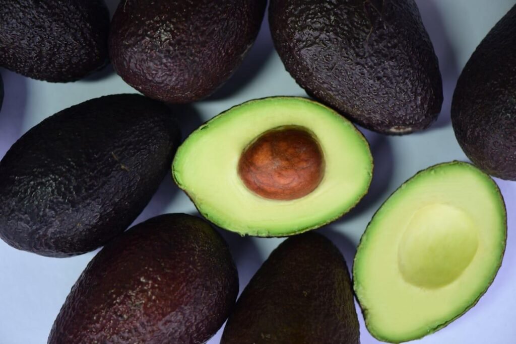 Fresh Avocados, one cut in half, a healthy fat and very good food for Construction Workers