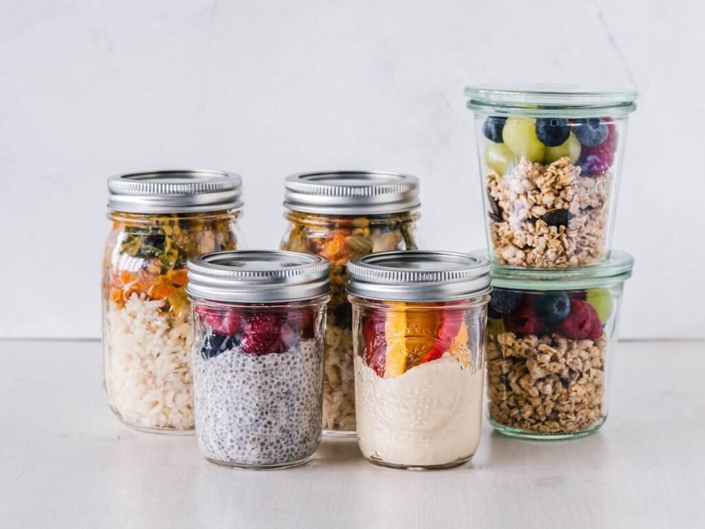 Healthy food in jars and containers ready for lunch and easy for tradies to bring to work.