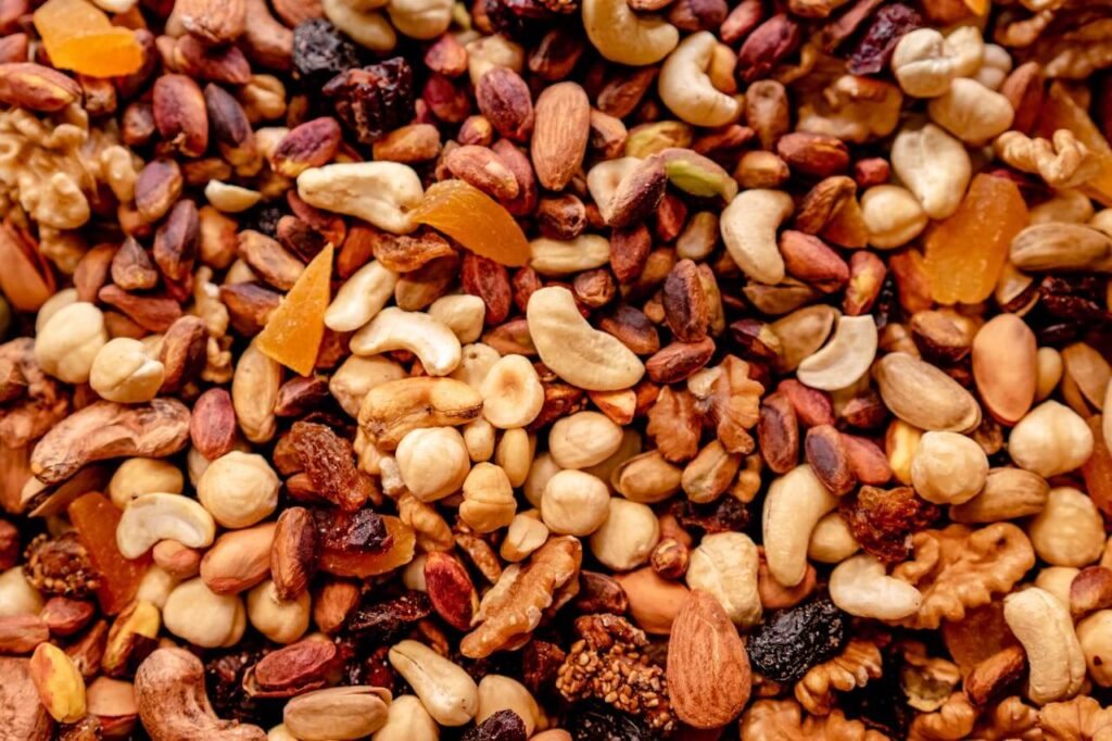 a pile of different types of nuts, a very healthy snack, showing Construction worker What to Eat at Smoko
