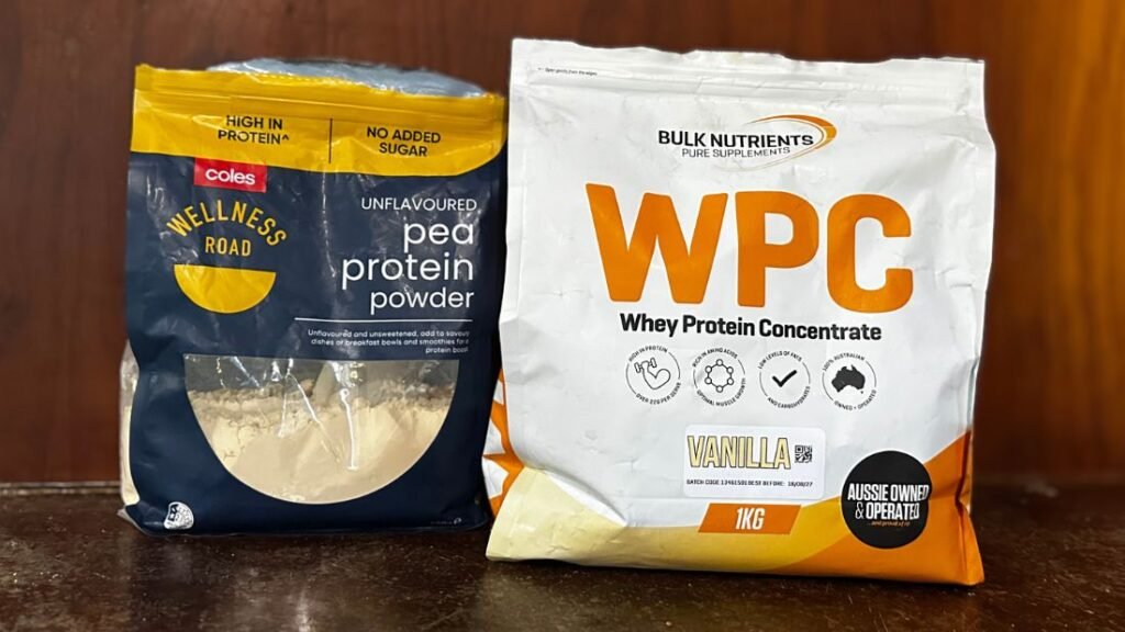Whey protein concentrate and pea protein powder supplements displayed side by side as common fitness protein supplements