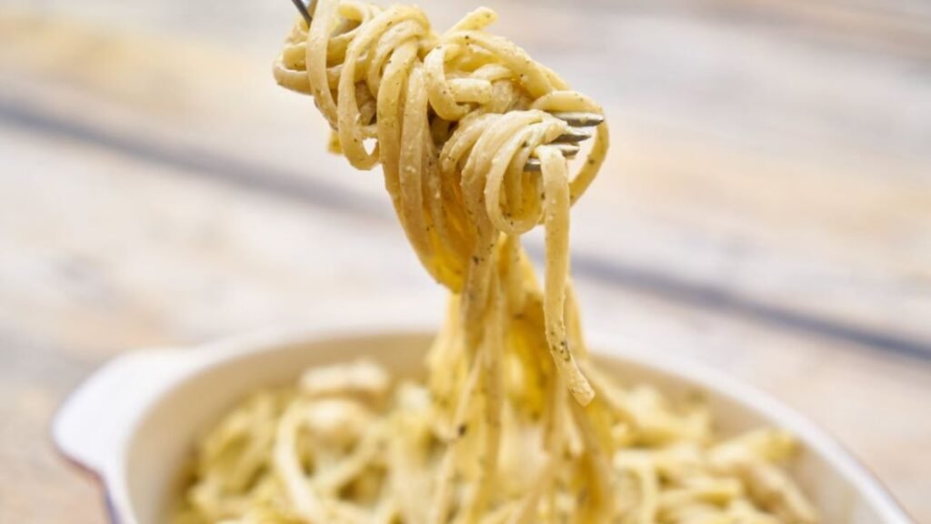A bowl of pasta representing carbohydrates for training energy and performance